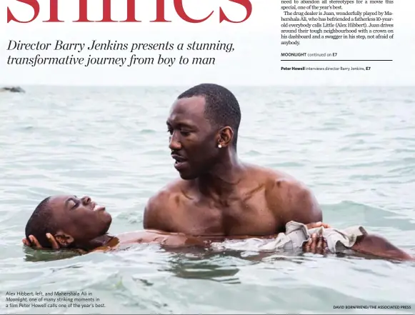  ?? DAVID BORNFRIEND/THE ASSOCIATED PRESS ?? Alex Hibbert, left, and Mahershala Ali in Moonlight, one of many striking moments in a film Peter Howell calls one of the year’s best.