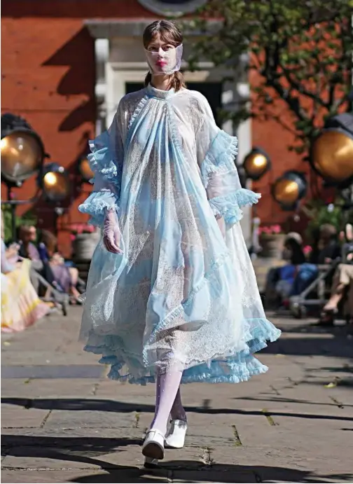  ?? Reuters ?? A model presents a creation during the Bora Aksu catwalk show at London Fashion Week 2020 on Friday.