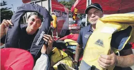  ?? MARTIN DE RUYTER/STUFF ?? Georgia Ririnui, left, and Bryan Hemi from Coastguard Nelson at the Nelson Marina for the Old4New Lifejacket Upgrade campaign.