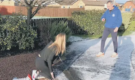  ??  ?? Sprint coach Andy Abbott and protégée Evie Compson had to resort to drills in the back garden through the snow and ice.