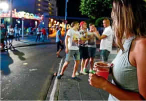  ?? AP ?? Authoritie­s in Spain’s Balearic Islands are clamping down on binge-drinking tourism, banning organised pub crawls and publicity promoting open bars and happy hours.