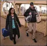  ?? NANCY ANDREWS / 412 FOOD RESCUE ?? Melinda Angeles and Eli Thomas transport a donation of bagels to a senior center in Pittsburgh.