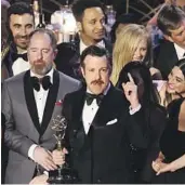  ?? Photograph­s by Myung J. Chun Los Angeles Times ?? JASON SUDEIKIS accepts “Ted Lasso’s” Emmy Award for comedy series, a predicted win.