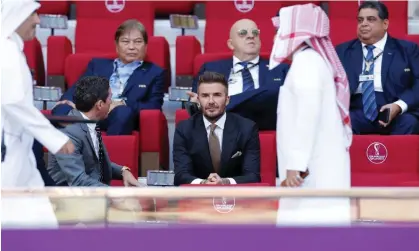  ?? Photograph: Tom Jenkins/The Guardian ?? David Beckham watches England v Iran at the World Cup.