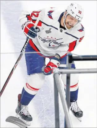  ?? AP PHOTO ?? Evgeny Kuznetsov was in pain after taking a big hit from Brayden Mcnabb of the Vegas Golden Knights in Game 2 of the Stanley Cup final.