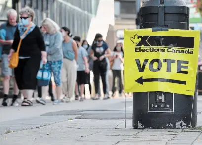  ?? BARRY GRAY THE HAMILTON SPECTATOR ?? Voters were lined up outside FirstOntar­io Centre in downtown Hamilton to cast their ballot on election day.