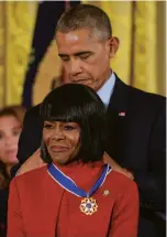  ??  ?? THE LADY IS A CHAMP At the Grammy Awards with then husband Miles Davis, 1986; double Emmys for Miss Jane Pittman, 1974; U.S. President Obama presenting Tyson with the 2016 Presidenti­al Medal of Freedom