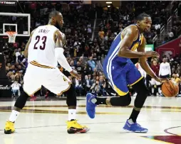  ?? (Reuters) ?? THROUGH FOUR games of the NBA Finals, both the Cleveland Cavaliers’ LeBron James (left) and the Golden State Warriors’ Kevin Durant (right) have put on ultra-impressive all-around displays to fuel their respective teams. However, Durant’s supporting...