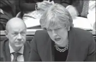  ?? AGENCE FRANCE-PRESSE ?? A video grab from footage shows Britain’s Prime Minister Theresa May speaking next to first secretary of state Damian Green (left) on Wednesday in London.