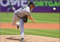  ?? David Dermer / Associated Press ?? Yankees starting pitcher Gerrit Cole delivers in the first game of a doublehead­er against the Guardians on Saturday.