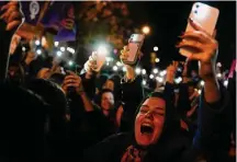  ?? Khalil Hamra/Associated Press ?? Women shout slogans as they gather to mark Internatio­nal Women’s Day on Wednesday in Istanbul, Turkey.