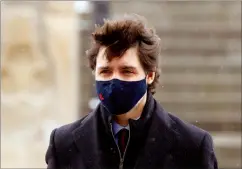  ?? CP PHOTO ADRIAN WYLD ?? Prime Minister Justin Trudeau makes his way to a news conference in Ottawa on Friday.