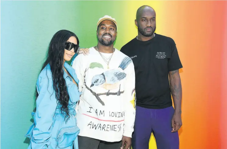  ?? PHOTOS: PASCAL LE SEGRETAIN / GETTY IMAGES ?? Kim Kardashian, Kanye West and designer Virgil Abloh after the Louis Vuitton Menswear Spring/Summer 2019 show as part of Paris Fashion Week on June 21 in Paris.