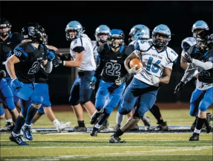  ?? JAMES BEAVER — FOR MEDIANEWS GROUP ?? North Penn’s Evan Spann (16) pushes downfield for a first down against CB South.