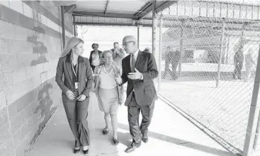  ?? Steve Gonzales / Houston Chronicle ?? Sen. John Whitmire, D-Houston, tours the Littlefiel­d site for sex offenders with Genna Brisson, left, operations chief of Correct Care, which manages the treatment center, and company president Marta Prado.