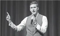  ?? JOE RAEDLE, GETTY IMAGES ?? Richard Spencer speaks in Gainesvill­e, Fla.