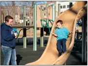  ?? NWA Democrat-Gazette/BEN GOFF • @NWABENGOFF ?? Tonya Bibrowicz watches Dec. 21 while her son, Branden Bibrowicz, 5, of Springdale plays at Dave Peel Park.