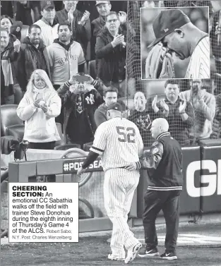  ??  ?? CHEERING SECTION: An emotional CC Sabathia walks off the field with trainer Steve Donohue during the eighth inning of Thursday’s Game 4 of the ALCS. Robert Sabo; N.Y. Post: Charles Wenzelberg