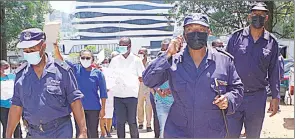  ?? Hlatshwayo) (Pics: Sithembile ?? Senior police officers leading the Mbabane Government Hospital Nurses Committee as they march to deliver the petition.