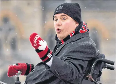  ?? CP PHOTO ?? Minister of Sport and Persons with Disabiliti­es Kent Hehr speaks during the official inaugurati­on of the Canada 150 Rink on Parliament Hill in Ottawa Thursday.