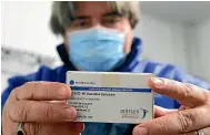  ?? AP ?? A box of Janssen vaccines is shown by pharmacist Zsolt Szenasi at a pharmaceut­ical warehouse in Budapest, Hungary, after the arrival of the first batch of the Johnson & Johnson Us-made onedose vaccine against Covid-19 in the country yesterday.