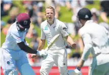  ?? Picture / Photosport ?? Neil Wagner celebrates the wicket of Shimron Hetmyer.