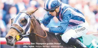  ?? Picture: MICHAEL DODGE/GETTY ?? Jockey Ben Thompson guides Prince Alby home.