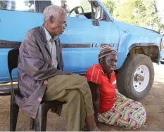  ??  ?? Mujaji with one of his youngest wives