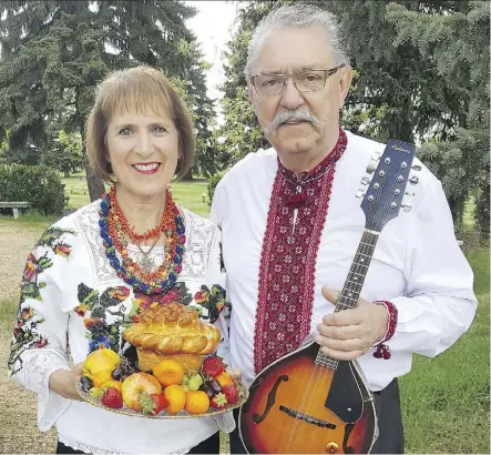  ??  ?? Former Speaker of the Alberta legislatur­e Gene Zwozdesky and wife Christine Zwozdesky at one of the many Ukrainian events they attend. Zwozdesky will be in Saskatoon Monday to help launch the centenary celebratio­ns of the Ukrainian Orthodox Church of...