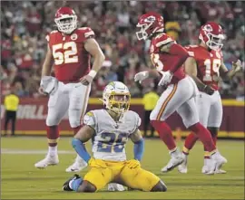  ?? Ed Zurga Associated Press ?? CHARGERS CORNERBACK Asante Samuel Jr. looks forlorn after kicker Matt Ammendola converted a field goal in the second half of the Chiefs’ victory.