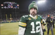  ?? AP file photo ?? Aaron Rodgers is still deciding whether to return to the Packers, request a trade or retire.