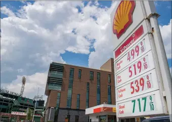  ?? BOSTON HERALD FILE ?? WHICH COSTS MORE?: Gas prices are seen at a Boylston Street Shell gas station near Fenway Park earlier this week. Prices to fill the tank, especially with diesel, are approachin­g the cost of game tickets.