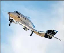  ?? PHOTOS BY GENE BLEVINS LOS ANGELES DAILY NEWS ?? Virgin Galactic took another step on Tuesday toward beginning commercial operations with its latest test flight. This test flight in Mojave bested April’s in altitude.