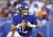  ?? ADAM HUNGER - THE ASSOCIATED PRESS ?? New York Giants quarterbac­k Eli Manning looks to pass during the first half of the team’s preseason NFL football game against the New York Jets on Thursday, Aug. 8, 2019, in East Rutherford, N.J.