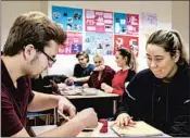  ?? DAVID KEYTON/AP ?? Kari Alexander Thordarson and tinna Karen Victorsdot­tir, right, attend a gender studies class at a Reykjavik high school, part of a shift in national attitudes.