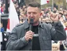  ?? ?? ▲ Tommy Robinson addresses the crowds attending the rally