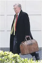 ?? LUIS M. ALVAREZ/ AP ?? Former national security adviser John Bolton has a memoir scheduled for release in March about his time in the Trump administra­tion. Democrats seized on allegation­s that President Trump told Bolton he wanted to withhold aid for Ukraine as leverage for an investigat­ion into Joe Biden.