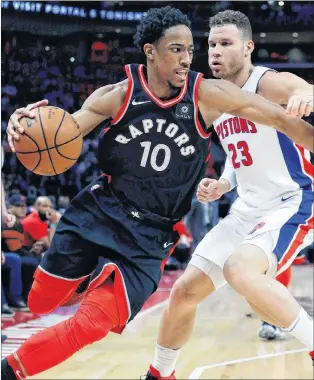  ?? AP PHOTO ?? Toronto Raptors guard Demar Derozan drives on Detroit Pistons forward Blake Griffin during the second half of an NBA game Wednesday night in Detroit.