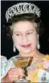  ?? ?? The Queen with champagne at a state banquet in Nepal in 1986