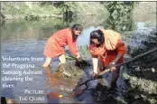  ?? PICTURE: THE QUINT ?? Volunteers from the Pragyana Satsang Ashram cleaning the river.