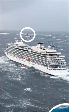  ??  ?? Helicopter­s winch passengers aboard cruise ship Viking Sky to safety, above