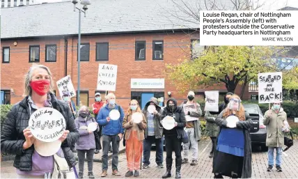  ?? MARIE WILSON ?? Louise Regan, chair of Nottingham People’s Assembly (left) with protesters outside the Conservati­ve Party headquarte­rs in Nottingham