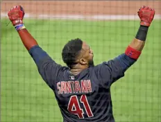  ?? Matt Freed/Post-Gazette ?? Cleveland’s Carlos Santana reacts after video review allowed his go-ahead three-run home run to stand in the 10th inning Tuesday night at PNC Park.