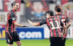  ?? AP ?? FC Seoul’s Dejan Damjanovic, left, celebrates his goal with teammate Molina Uribe..