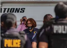  ?? RICH HUNDLEY III — FOR THE TRENTONIAN ?? Trenton Police director Sheilah Coley held roll call for foot patrol officers in Mill Hill Park recently.