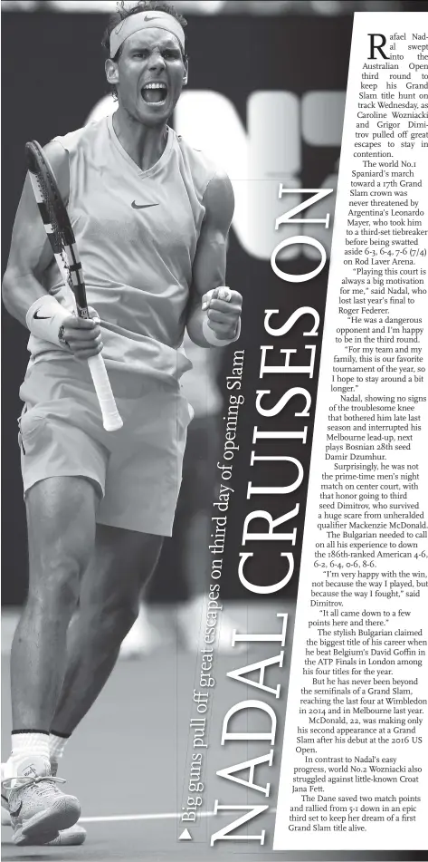  ??  ?? Rafael Nadal of Spain celebrates winning his second-round match against Leonardo Mayer of Argentina on Day 3 of the 2018 Australian Open at Melbourne Park on Wednesday in Melbourne, Australia.