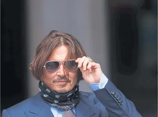  ??  ?? SUPERSTAR: Hollywood actor Johnny Depp is suing News Group Newspapers over an article that accused him of beating his former wife