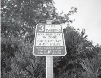  ?? L. TODD SPENCER/STAFF ?? An on-street parking sign that limits parking to three hours. Residents of Cavalier Shores, the historic neighborho­od next to the Cavalier hotel property, want to extend onstreet parking limits to deter hotel and constructi­on workers from taking up parking spaces.