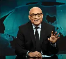  ?? BRYAN BEDDER/COMEDY CENTRAL ?? On his last show, Larry Wilmore said that the world map behind him was upside down to disagree that the “world should be seen in a certain way.”