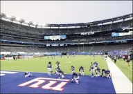  ?? Al Bello / Getty Images ?? The New York Giants warm up prior to the start of game against the Pittsburgh Steelers at MetLife Stadium on Sept. 14 in East Rutherford, N.J.
